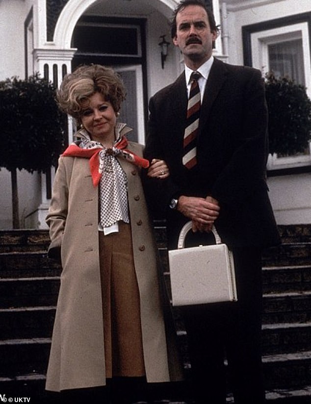 They became the inspiration for Basil and Sybil Fawlty in Fawlty Towers after Monty Python's John Cleese visited the hotel with his co-stars and encountered the 'wonderfully rude' Sinclair. Above: Cleese and Prunella Scales as Basil and Sybil