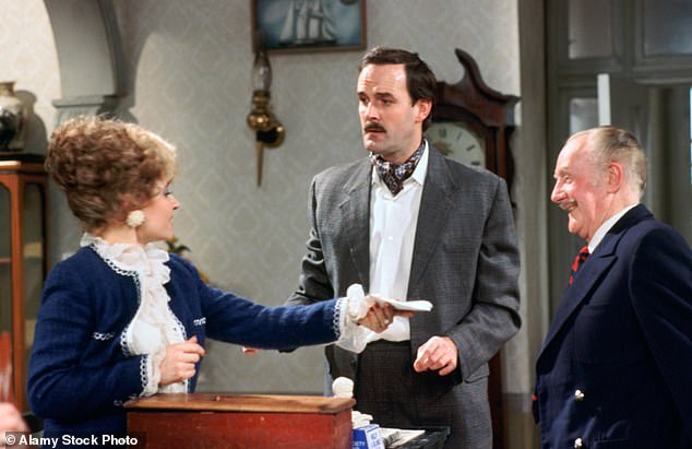 Scales made the role her own after being cast in Fawlty Towers, reinventing Sybil into the icon still beloved by audiences today (pictured with Cleese and Ballard Berkeley)