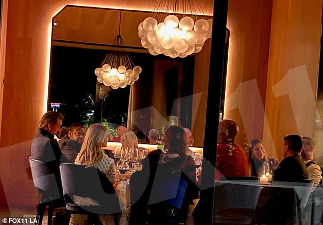 Newsom is shown above, left, sitting with ten others in the dining room at The French Laundry on November 6, without a mask. The photos were obtained by Fox 11 LA via a Twitter user