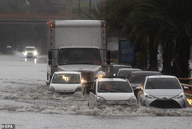 The storm has already dropped heavy rain in the Dominican Republic (pictured), where four people are believed to have been killed