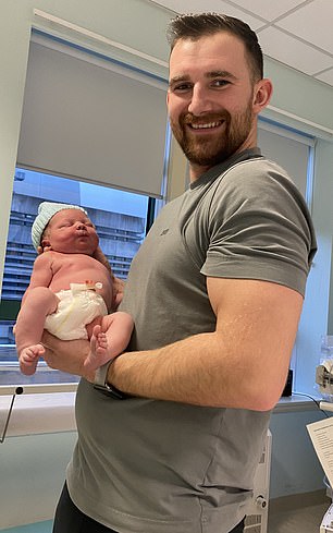 Angus with Mason, who developed hypothermia and died of sepsis