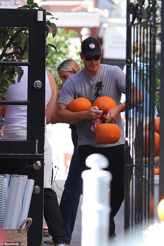 Chris also carried several pumpkins out of the patch