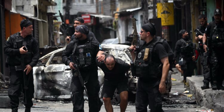 'Bodies strewn across streets' after huge police operation in Rio de Janeiro's favelas as 2,500 cops storm gang's HQ