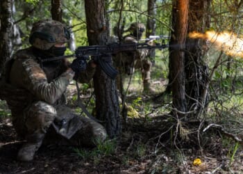 Brit fighting in Ukraine died from 'single gunshot to the roof of his mouth' after leg injuries from explosive