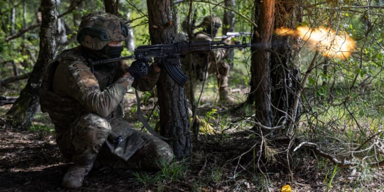 Brit fighting in Ukraine died from 'single gunshot to the roof of his mouth' after leg injuries from explosive