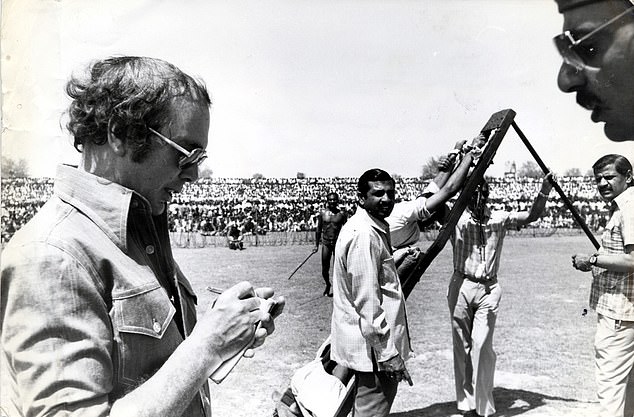 Edwards reporting at the scene of a public flogging at the Faisalbad Cricket Stadium, Pakistan