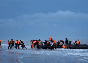 Migrant who re-entered Britain on small boat after being deported under 'one in, one out' deal is STILL in UK