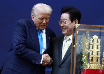 Watch as gleeful Trump is gifted a GOLDEN CROWN in South Korea