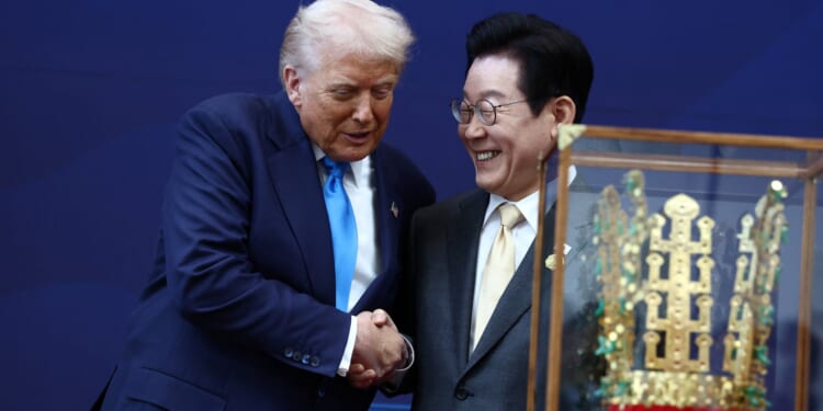 Watch as gleeful Trump is gifted a GOLDEN CROWN in South Korea