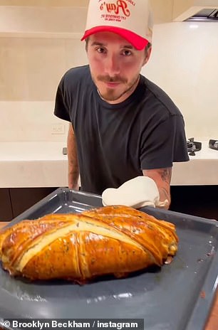 Brooklyn looked thrilled as he revealed the gold pastry with the perfectly pink beef inside
