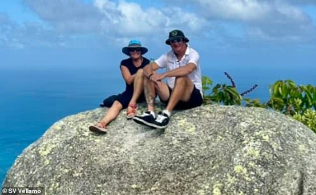Ayris and her partner Matthew (pictured), who were aboard SV Vellamo anchored near Lizard Island, were listening to emergency radio transmissions sent from the Coral Expeditions vessel