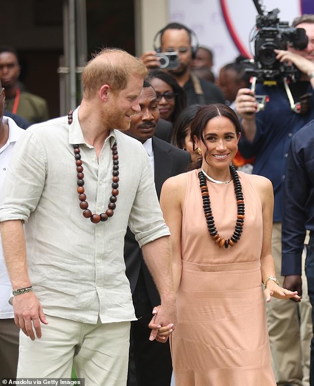 After their arrival in Abuja on May 10, the couple headed to the Lightway Academy school wearing fuss-free, light-coloured attire that was suited the west African country's hot weather