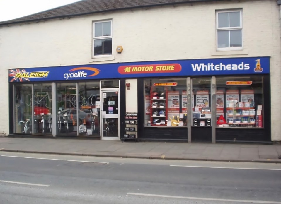 Storefront of Cyclelife and Whitehead's Motor Store.