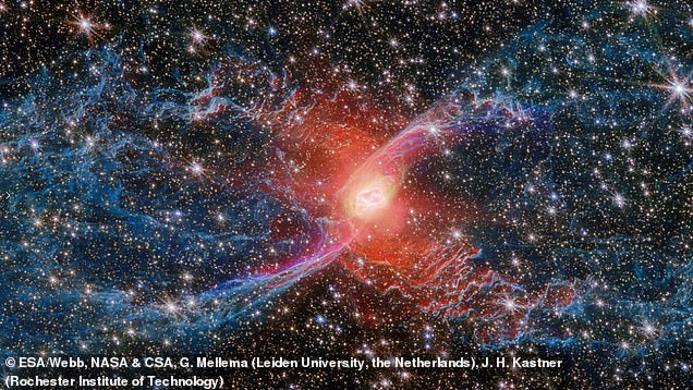 Meanwhile the new image reveals a strong red centre and blue loops of molecular gas, with thousands of stars in the background