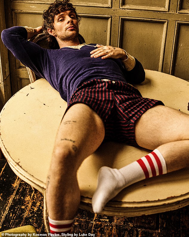 In one steamy shot, the Something In The Water hitmaker reclined on a vintage round table wearing nothing but a pair of red-and-black striped boxers, a purple V-neck top and matching striped gym socks