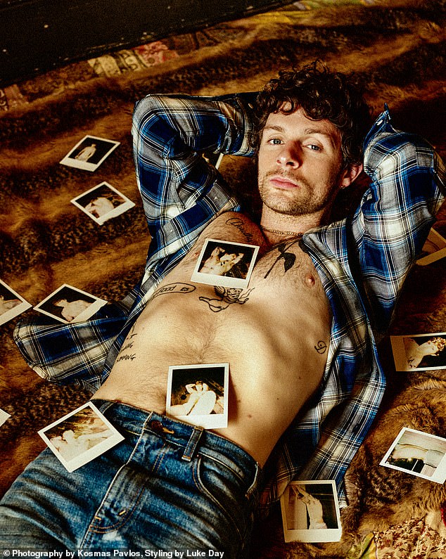 Switching up his look, Tom flaunted his muscular physique once again as he posed on a carpet surrounded by sexy Polaroids, wearing a blue-and-white checked shirt teamed with jeans