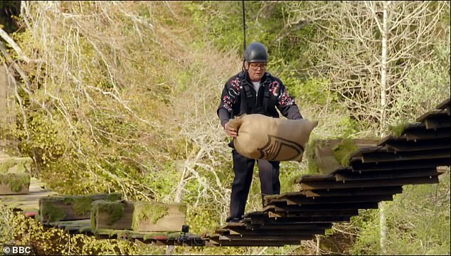 After successfully crossing the bridge, he secured £2,500 for the prize pot before he cried: 'I feel like a winner... and a eunuch'