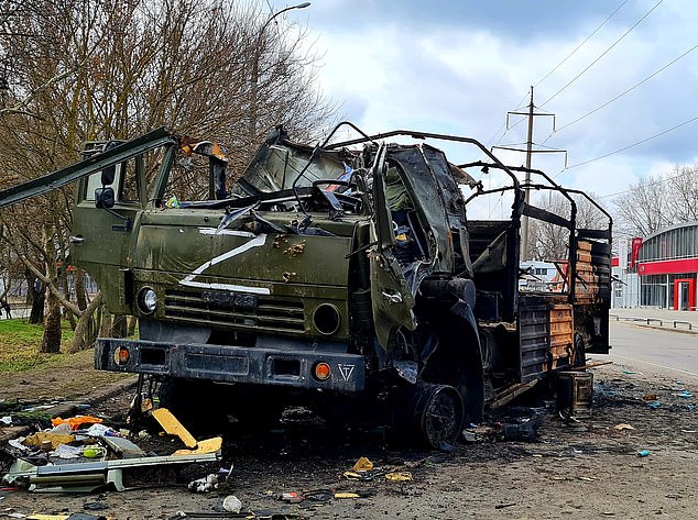 A destroyed vehicle after Russian shelling attacks in Kherson. Anastasiia gave birth soon after the Russian bombing of Mariupol's maternity hospital, which left three dead and 17 injured - including women in labour