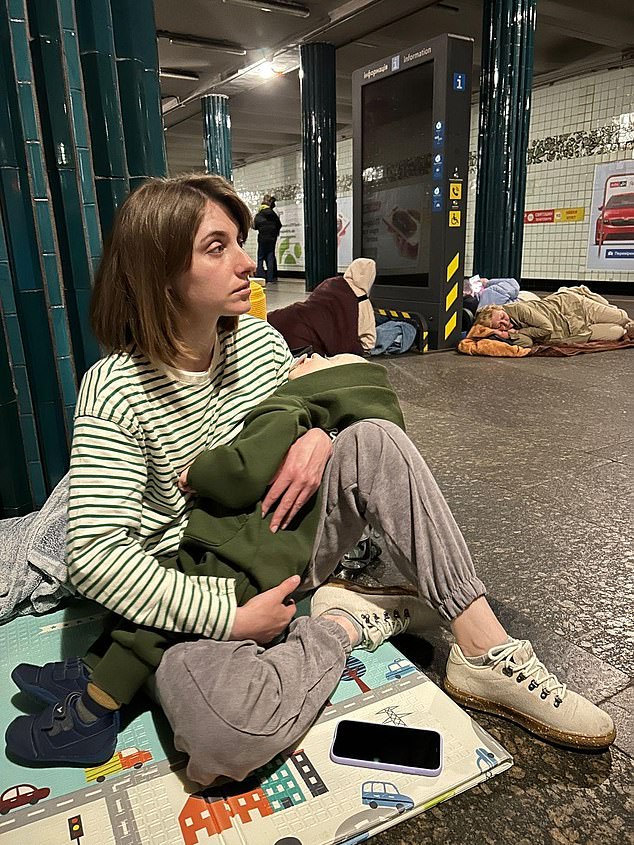 Yevheniia, pictured sheltering with her son