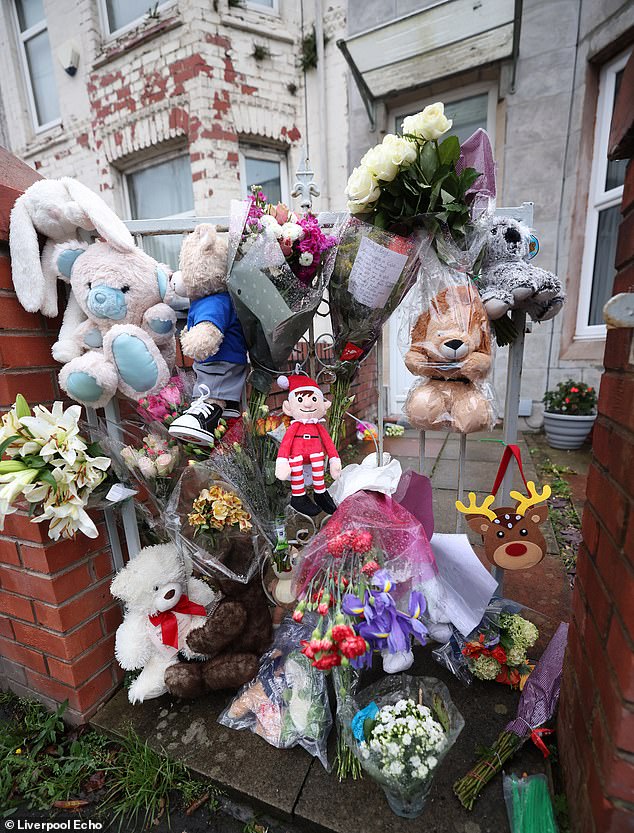 Tributes outside a house on Percy Road in Seacombe, Merseyside, after the death of three-month-old Miguel Pirjani
