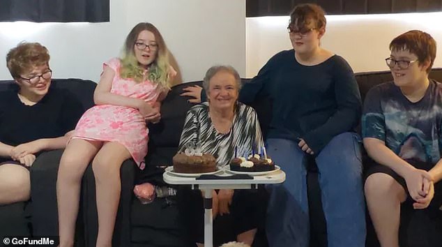 Elizabeth, 81, is pictured with her four grandchildren in Logan, Queensland