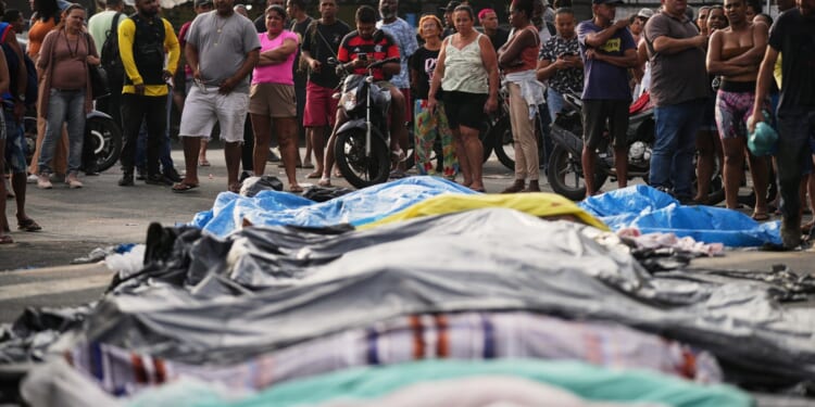 How Rio de Janeiro's cops herded gangsters out of favelas & trapped them in woods during 'mega-op' that killed over 130