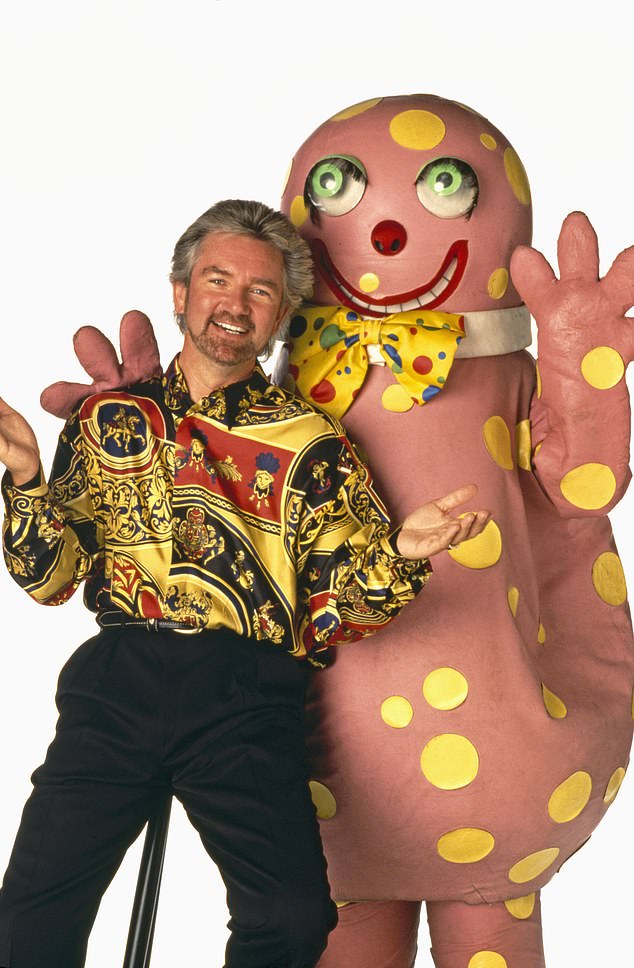 Mr Blobby originally featured on the British Saturday night variety show Noel's House Party, broadcast on BBC One with host Noel Edmonds (pictured in 1995)