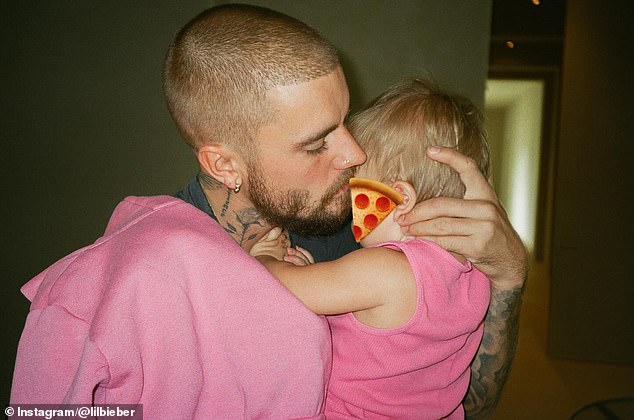 She also talked about her husband Justin being a father and expressed, 'If he's not with me, he's with his dad. He's always with his family and he's always with one of us, or with his godparents'