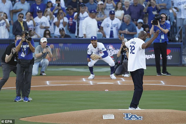 Johnson celebrates after throwing a strike with the first pitch before the World Series Game 5