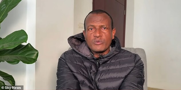 Kebatu told Sky News : 'Saturday I get a police. Police I am wanted man, I arrested, I give you my hand (sic)'