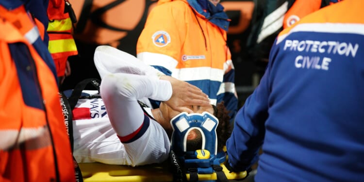 Desire Doue leaves stadium on crutches as PSG star, 20, suffers horror injury during Ligue 1 clash