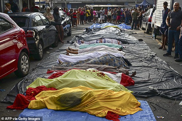As many as 2,500 heavily armed officers, backed by armored vehicles, helicopters and drones took part in the operation targeting Brazil's main drug-trafficking gang in two favelas, in Rio