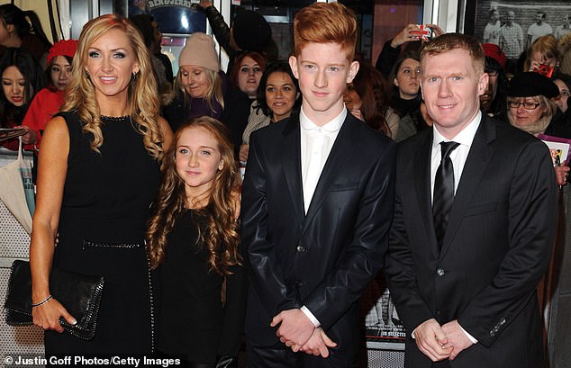 Paul and wife Claire (left), pictured with Arron and Alicia in 2013 for the Class Of 92 film, are now separated and share custody of their youngest son (not pictured)