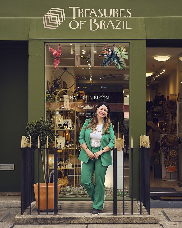 Treasures of Brazil owner Daiane Brambila Ferry, 40, stands in front of her shop in Marylebone, where several shops are being targeted by thieves