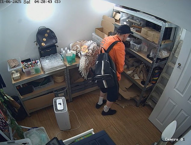 The robber, wearing a bright orange jacket and equipped with a leather bag, went through the store searching every corner and in every cupboard in case there was any loose cash