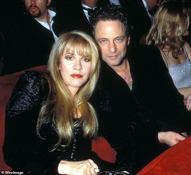 Nicks and Buckingham of Fleetwood Mac posing for a photograph at the 1998 Grammy Awards