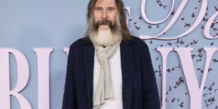 TV legend, 72, looks unrecognisable with long grey beard as he hits the red carpet