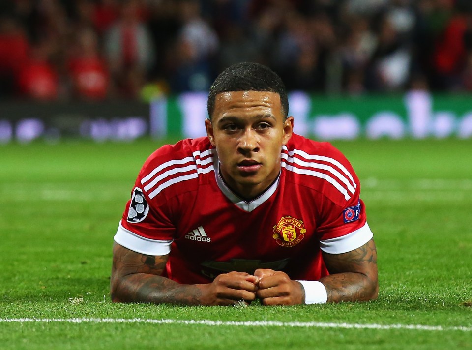 Memphis Depay of Manchester United on the ground after failing to score against Club Brugge.
