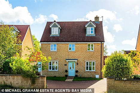 This contemporary, five-bedroom, three-storey detached house is a perfect fit for a growing family