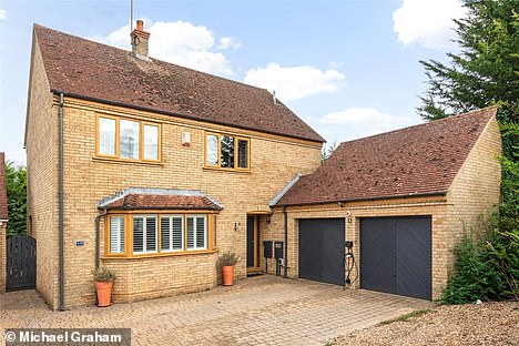 With more contemporary furnishings in a countryside location, this four-bedroom detached house has a double garage, private gardens and off-street parking