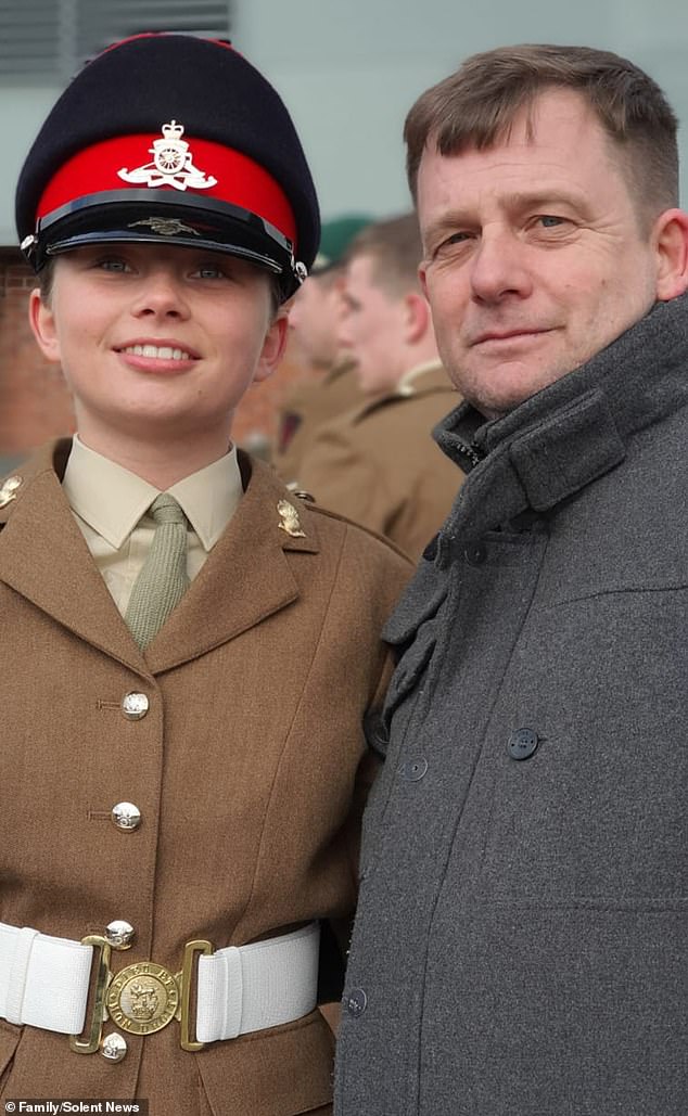 Gunner Beck during her passing out parade with her father, Anthony Beck