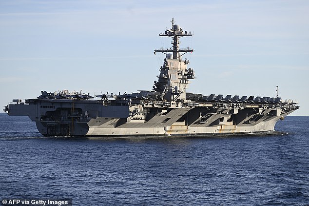 The USS Gerald R. Ford, the world's largest aircraft carrier, seen in the North Sea during NATO Neptune Strike 2025 exercise on September 24, 2025 in the North Sea. Washington is deploying an aircraft carrier and accompanying ships to counter drug-trafficking organizations in Latin America, the Pentagon said on October 24