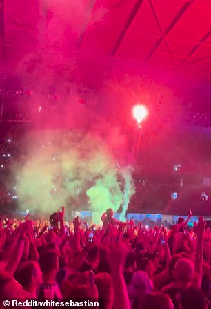 Footage of the incident shows the bright red light illuminating the nosebleeds before someone threw the flare into the surrounding crowd