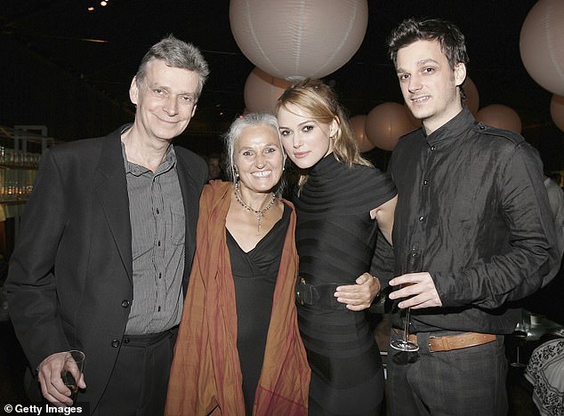 Keira said: 'If I dropped a grade, I wasn't allowed to [act], if I didn't behave at school, I wasn't allowed to do it, if I didn't improve with reading, I wasn't allowed to do it' (the family pictured at a pre-Oscar party  in 2006)