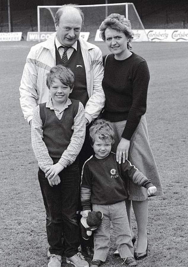 But his bubbly, self-deprecating manner masks a steely side, which is very much a result of his unusual upbringing. Pictured: Alan (bottom left) with his father Graham, then manager of Northampton Town, mother and brother in 1985