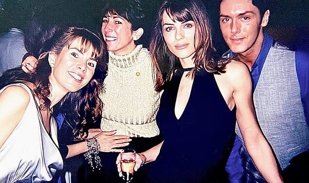 Actress Elizabeth Hurley poses at a party in October 1996 with ¿friend¿ Ghislaine Maxwell in a bombshell picture posted last night on social media