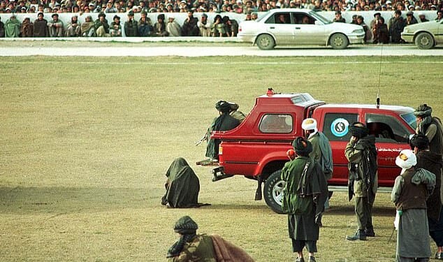 Illustrative image shows an alleged murderer being executed before a crowd in Kabul in 1998