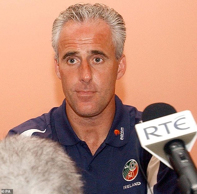 Speaking on the debut episode of his podcast, Woody Unscripted, of which the Daily Mail has been given an exclusive preview, he talks with former Republic Ireland player and manager Mick McCarthy (pictured in 2002) who is Mike's best friend of 41-years and Aimee-Lou's godfather