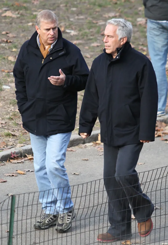 Prince Andrew and Jeffrey Epstein walking together in a park.