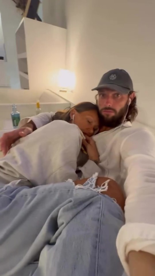 Andy Carroll and Lou Teasdale embracing.